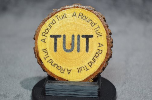 Laser engraved round tuit novelty item